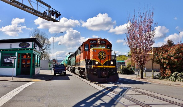 Trains, planes, and automobiles. It’s all regulated, and it’s all here in the Digest! BNSF Railway hauls freshly built Boeing 737 fuselages through the city streets of Renton, Washington en route to the aerospace giant’s nearby final assembly plant on Friday, March 25th, 2016. (Image © 3/2016 by Nikki Burgess; all rights reserved)