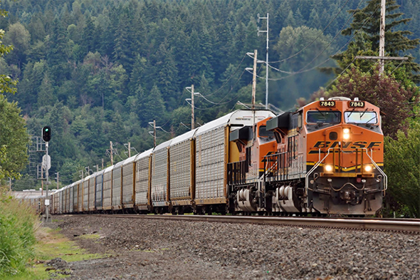 The nation gained a step this week when the FRA renewed the charter of the Railroad Safety Advisory Committee, an expert group working hard to help keep goods—like these vehicles being hauled by a BNSF train in Sumner, Washington recently—as well as people moving safely on our extensive rail network. Image © 5/2016 by Nikki Burgess; all rights reserved.